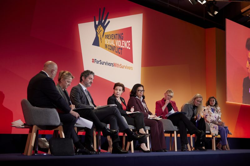 Speakers on stage at the Preventing sexual violence in conflict conference