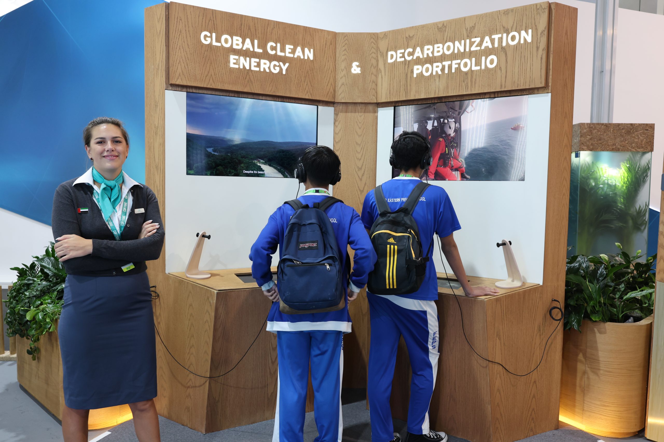 Children interacting with Mubadala stand activity