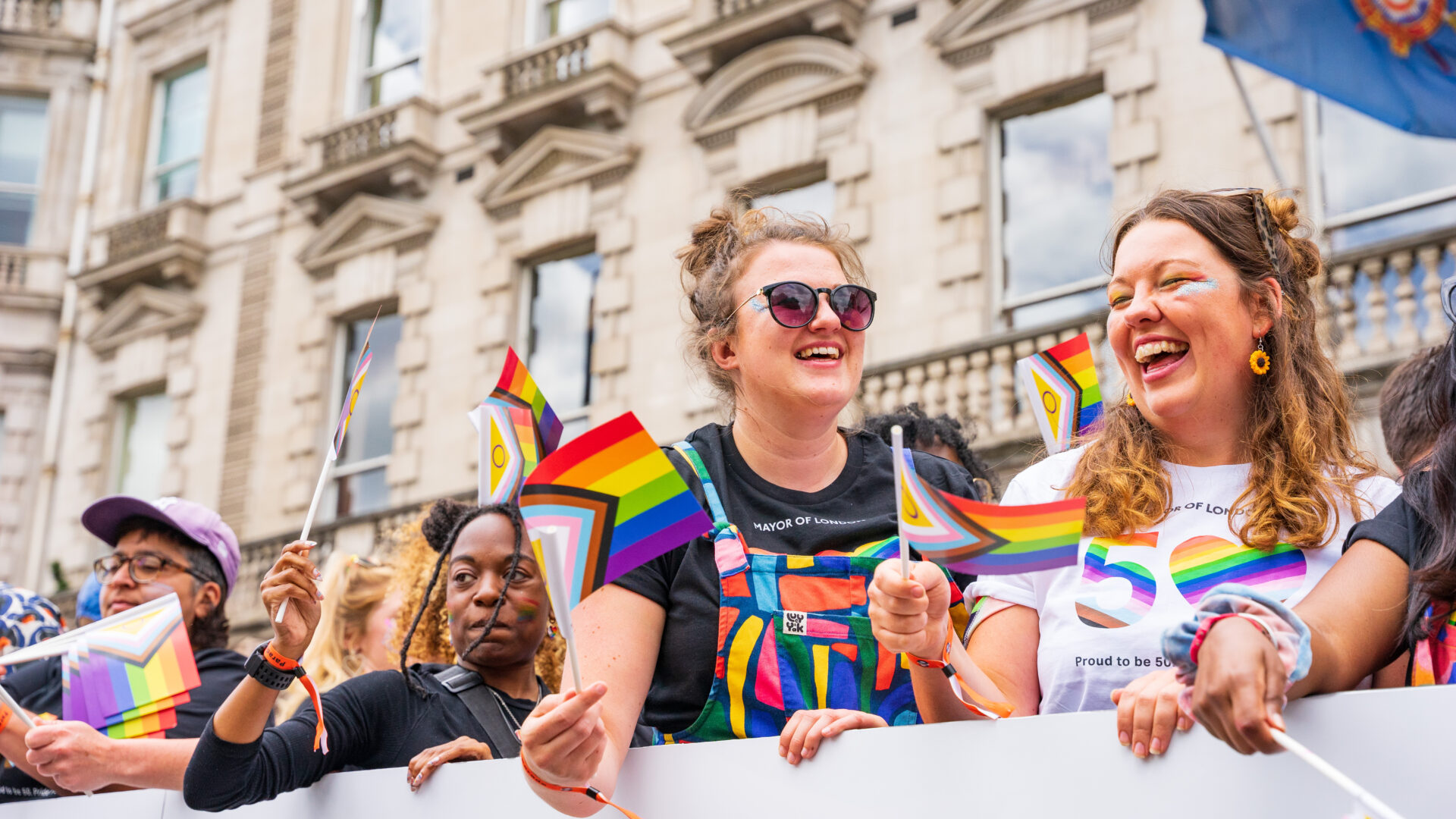 People waving flags at London pride