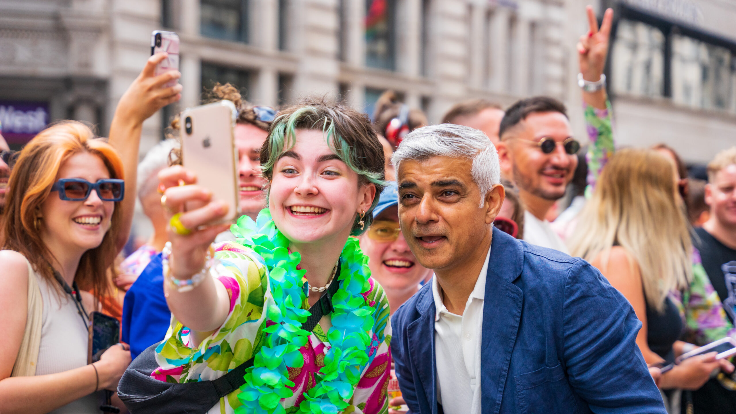 London Pride attendee having a photo with Mayor of London