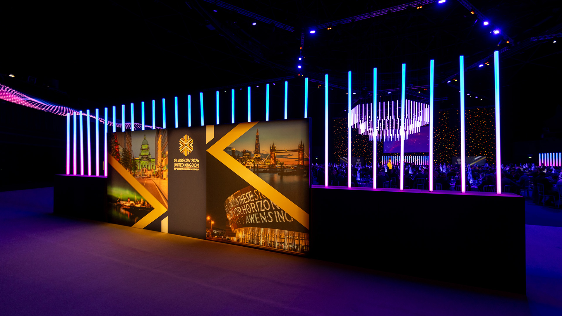 Large lit up sign at the entrance to a gala dinner at Interpol